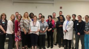 Maudie St. Denis and Commonwealth Place staff