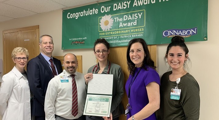 Melanie Cadin, RN, DAISY recipient with Crouse leadership